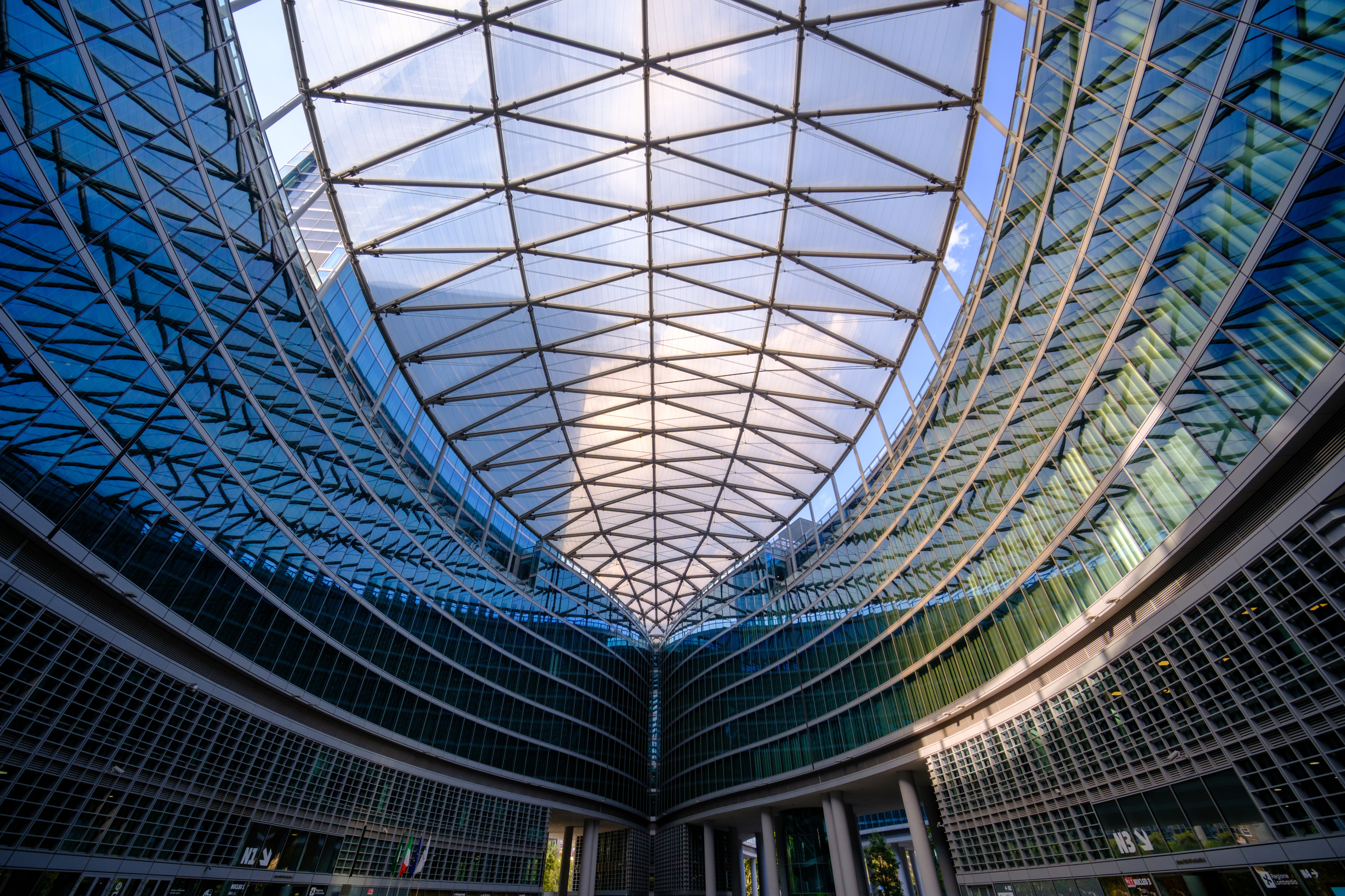 Mixed-use tower composition with layered glazing